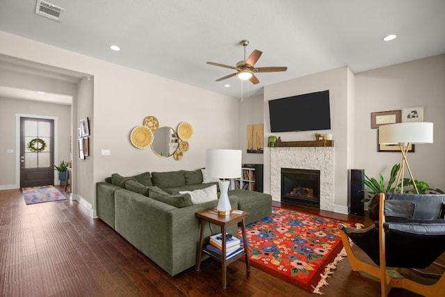 1609 Indian Apple Way, Leander, TX 78641 - living room with a ceiling fan, wood finished floors, a fireplace, baseboards, and recessed lighting