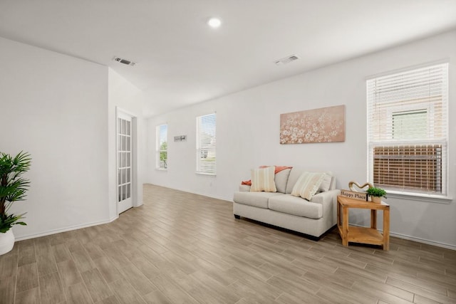 637 Pickrell Loop, Liberty Hill, TX 78642 - living area featuring light wood finished floors and baseboards