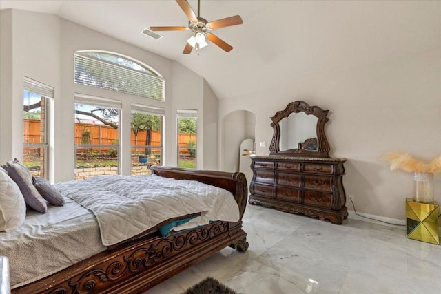 2997 Agave Loop, Round Rock, TX 78681 - bedroom featuring vaulted ceiling, marble finish floors, a ceiling fan, and arched walkways