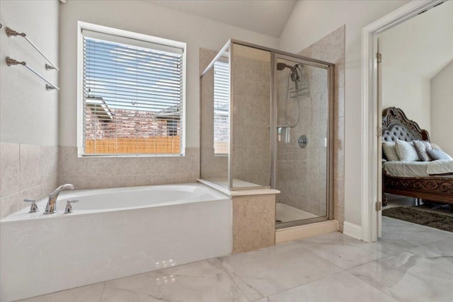 2997 Agave Loop, Round Rock, TX 78681 - ensuite bathroom featuring a bath, a shower stall, and marble finish floors