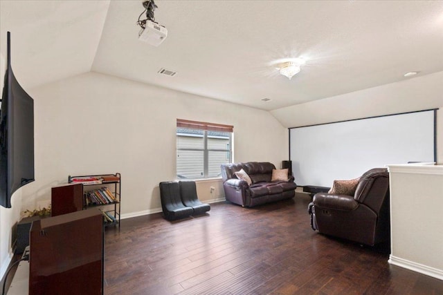 2997 Agave Loop, Round Rock, TX 78681 - cinema room featuring lofted ceiling and wood finished floors