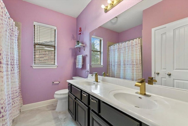2997 Agave Loop, Round Rock, TX 78681 - bathroom featuring double vanity and a shower with shower curtain