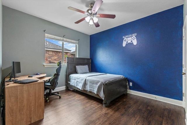 2997 Agave Loop, Round Rock, TX 78681 - bedroom featuring wood finished floors, an office area, and a ceiling fan