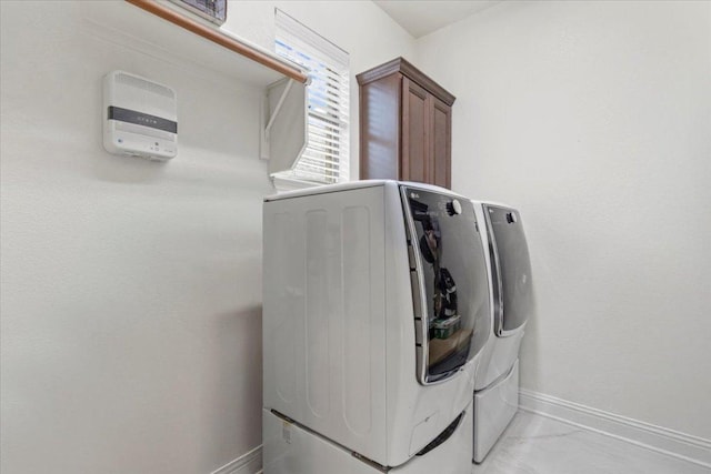 2997 Agave Loop, Round Rock, TX 78681 - laundry room with separate washer and dryer, cabinet space, and light marble finish floors