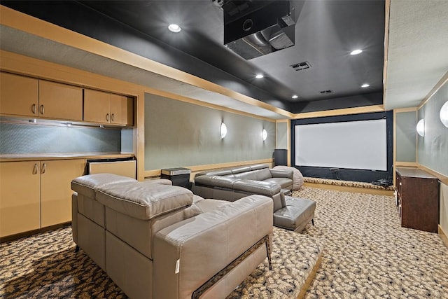148 Oak Plaza Dr, Georgetown, TX 78628 - home theater room featuring carpet flooring, a raised ceiling, baseboards, and recessed lighting