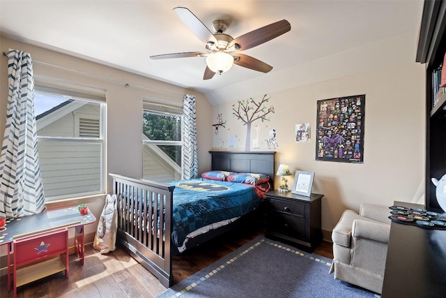 148 Oak Plaza Dr, Georgetown, TX 78628 - bedroom featuring wood finished floors, ceiling fan, and vaulted ceiling