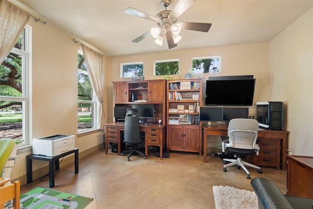 148 Oak Plaza Dr, Georgetown, TX 78628 - office space with light tile patterned flooring, a ceiling fan, and baseboards