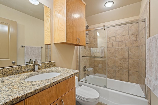 148 Oak Plaza Dr, Georgetown, TX 78628 - full bathroom with vanity, shower / bath combination with glass door, and toilet