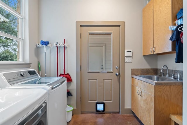 148 Oak Plaza Dr, Georgetown, TX 78628 - laundry room with cabinet space and washer and dryer