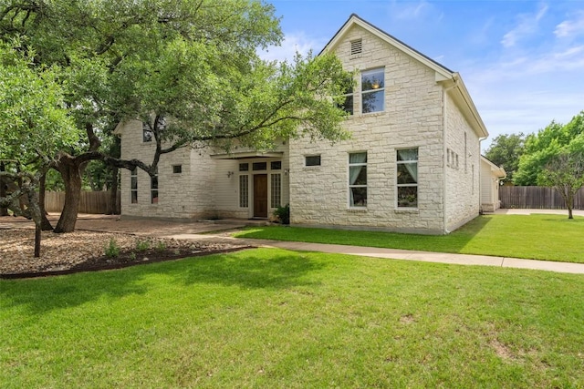 148 Oak Plaza Dr, Georgetown, TX 78628 - back of property with stone siding
