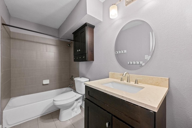 5601 Samuel Huston Ave, Austin, TX 78721 - bathroom with vanity, shower / tub combination, tile patterned flooring, and a textured wall