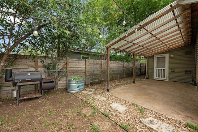 5601 Samuel Huston Ave, Austin, TX 78721 - fenced backyard featuring a patio