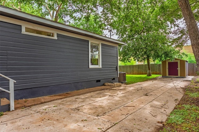 3210 Funston St, Austin, TX 78703 - view of side of home with crawl space, a patio area, and cooling unit