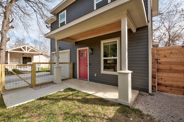 105 Elkhart St Unit 3, Austin, TX 78702 - view of exterior entry featuring a garage