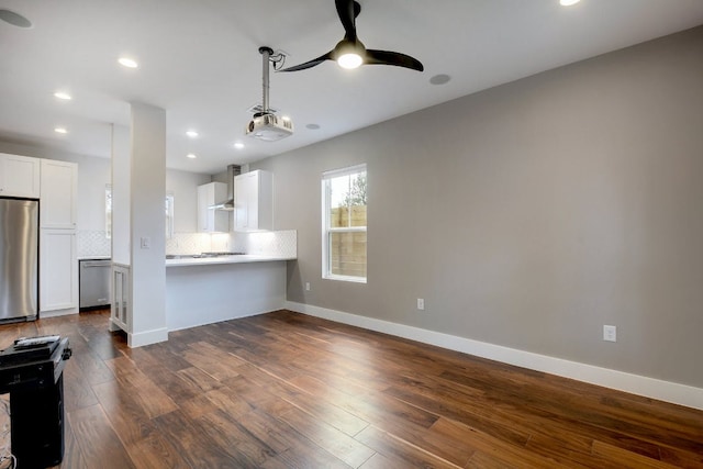 105 Elkhart St Unit 3, Austin, TX 78702 - unfurnished living room with ceiling fan, dark wood finished floors, recessed lighting, and baseboards