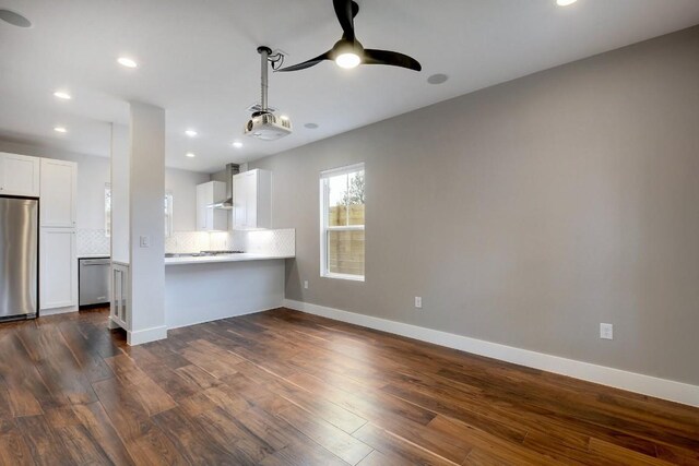 105 Elkhart St Unit 3, Austin, TX 78702 - unfurnished living room featuring ceiling fan, dark wood-style floors, recessed lighting, and baseboards