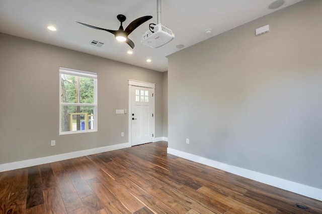 105 Elkhart St Unit 3, Austin, TX 78702 - spare room with a ceiling fan, dark wood finished floors, baseboards, recessed lighting, and a smoke detector