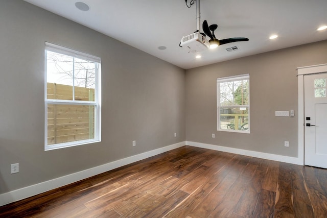 105 Elkhart St Unit 3, Austin, TX 78702 - spare room featuring dark wood-style floors, baseboards, recessed lighting, and a ceiling fan