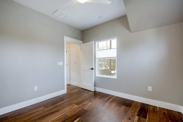 105 Elkhart St Unit 3, Austin, TX 78702 - spare room featuring dark wood-style floors, baseboards, and a ceiling fan