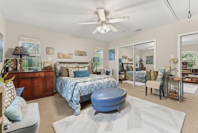 1181 Live Oak Trl, Liberty Hill, TX 78642 - carpeted bedroom with attic access, multiple windows, and a closet