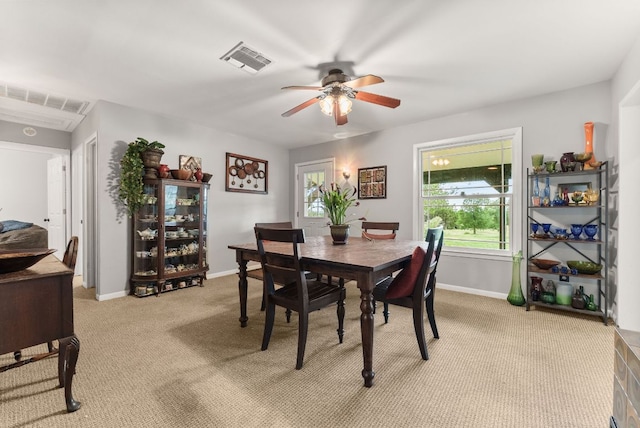 1181 Live Oak Trl, Liberty Hill, TX 78642 - dining space featuring ceiling fan, light carpet, and baseboards
