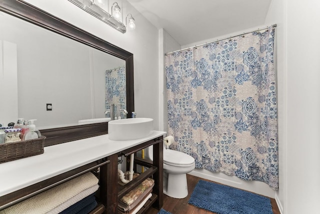 1181 Live Oak Trl, Liberty Hill, TX 78642 - bathroom with toilet, wood finished floors, and vanity