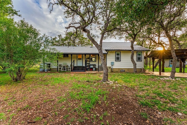 1181 Live Oak Trl, Liberty Hill, TX 78642 - rear view of property with metal roof