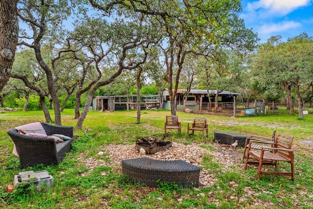 1181 Live Oak Trl, Liberty Hill, TX 78642 - view of yard featuring an outbuilding and view of scattered trees