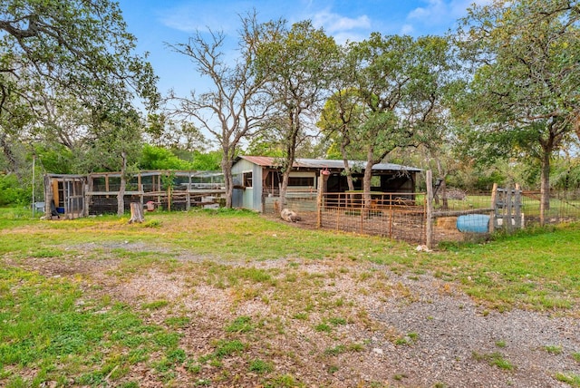 1181 Live Oak Trl, Liberty Hill, TX 78642 - view of yard featuring an exterior structure and an outbuilding