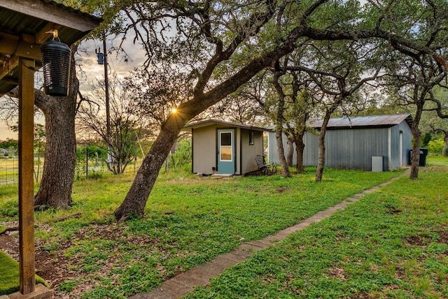 1181 Live Oak Trl, Liberty Hill, TX 78642 - view of grassy yard with an outbuilding