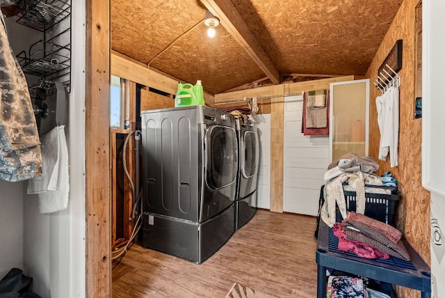 1181 Live Oak Trl, Liberty Hill, TX 78642 - laundry room featuring independent washer and dryer and wood finished floors