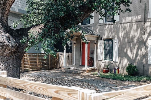 2623 Salado St, Austin, TX 78705 - doorway to property featuring brick siding