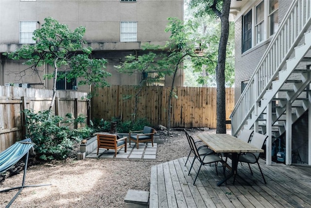 2623 Salado St, Austin, TX 78705 - view of patio / terrace featuring stairs, a wooden deck, and outdoor dining space