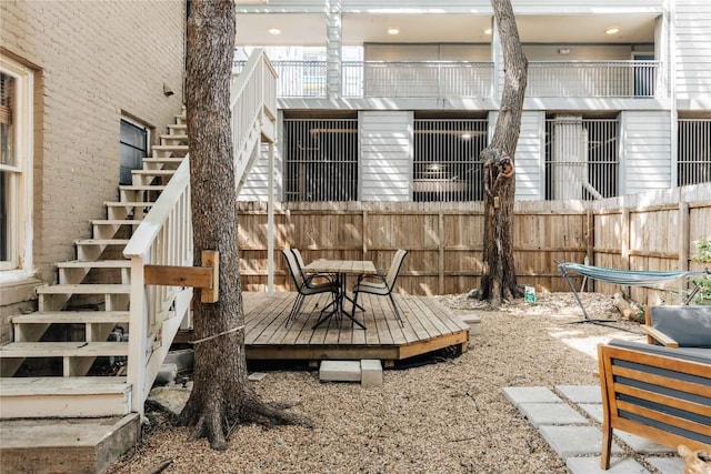 2623 Salado St, Austin, TX 78705 - view of patio featuring stairs, a wooden deck, and outdoor dining space