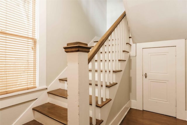 2623 Salado St, Austin, TX 78705 - stairs with wood finished floors, plenty of natural light, and baseboards
