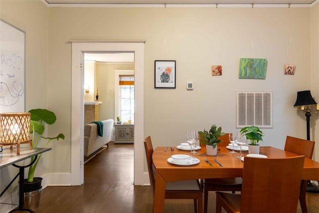 2623 Salado St, Austin, TX 78705 - dining space featuring dark wood-style flooring and baseboards