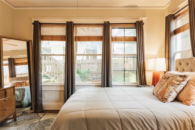 2623 Salado St, Austin, TX 78705 - bedroom featuring multiple windows and ornamental molding