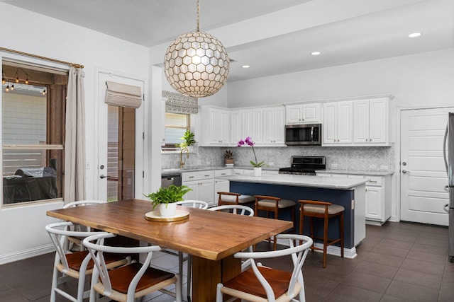 1518 Frontier Valley Dr, Austin, TX 78741 - dining space featuring dark tile patterned flooring and recessed lighting