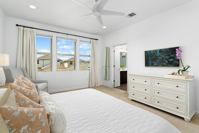 1518 Frontier Valley Dr, Austin, TX 78741 - bedroom featuring light carpet, baseboards, recessed lighting, ensuite bathroom, and ceiling fan