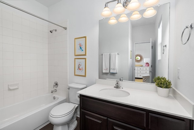 1518 Frontier Valley Dr, Austin, TX 78741 - ensuite bathroom with vanity, bathtub / shower combination, and toilet