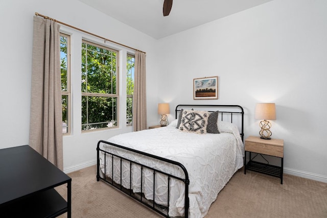 1518 Frontier Valley Dr, Austin, TX 78741 - bedroom featuring carpet flooring, baseboards, and ceiling fan