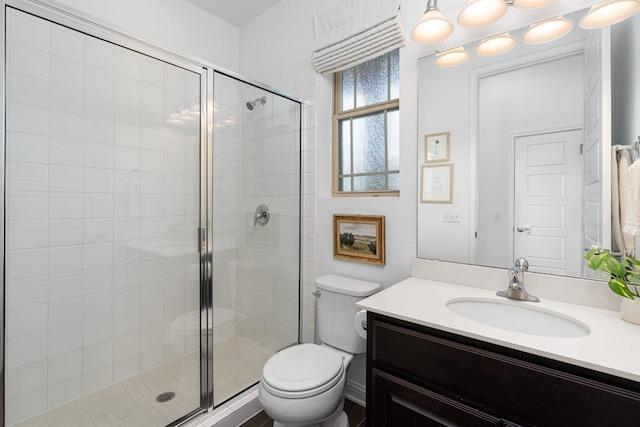 1518 Frontier Valley Dr, Austin, TX 78741 - full bathroom with vanity, a stall shower, and toilet