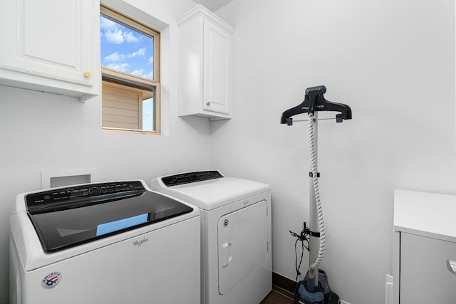 1518 Frontier Valley Dr, Austin, TX 78741 - laundry room with cabinet space and washer and dryer