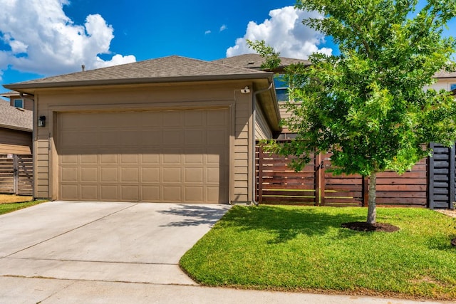 1518 Frontier Valley Dr, Austin, TX 78741 - ranch-style home featuring concrete driveway, a garage, and roof with shingles
