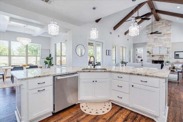 605 Unity Dr, Leander, TX 78641 - kitchen featuring stainless steel dishwasher, a sink, beamed ceiling, a chandelier, and ceiling fan