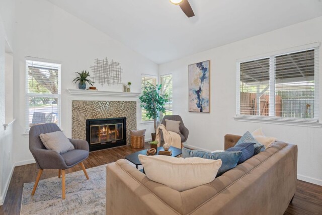 8508 Croydon Loop, Austin, TX 78748 - living area with vaulted ceiling, a ceiling fan, a fireplace, and dark wood-type flooring