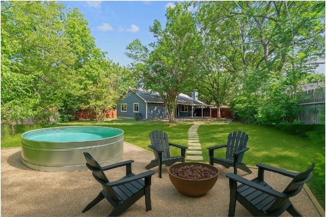 8508 Croydon Loop, Austin, TX 78748 - view of patio / terrace with an outdoor fire pit and a jacuzzi