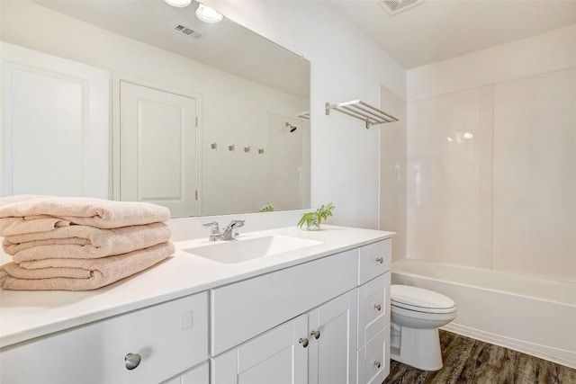 163 Wonderful Life Way, Jarrell, TX 76537 - full bathroom featuring toilet, vanity, wood finished floors, and tub / shower combination