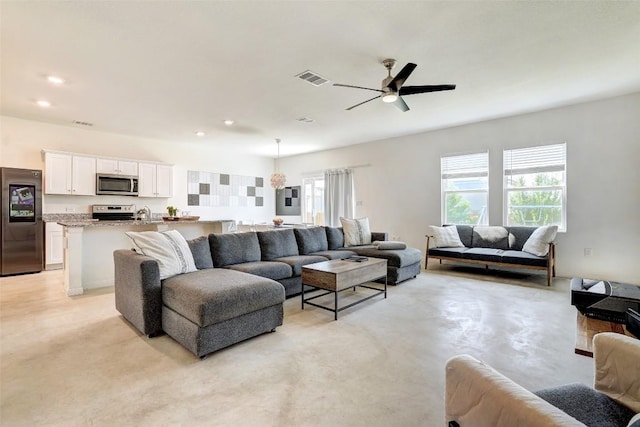 163 Wonderful Life Way, Jarrell, TX 76537 - living room with ceiling fan and recessed lighting