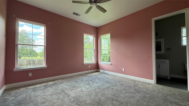 128 Gloria Blvd, Smithville, TX 78957 - carpeted empty room featuring ceiling fan and healthy amount of natural light